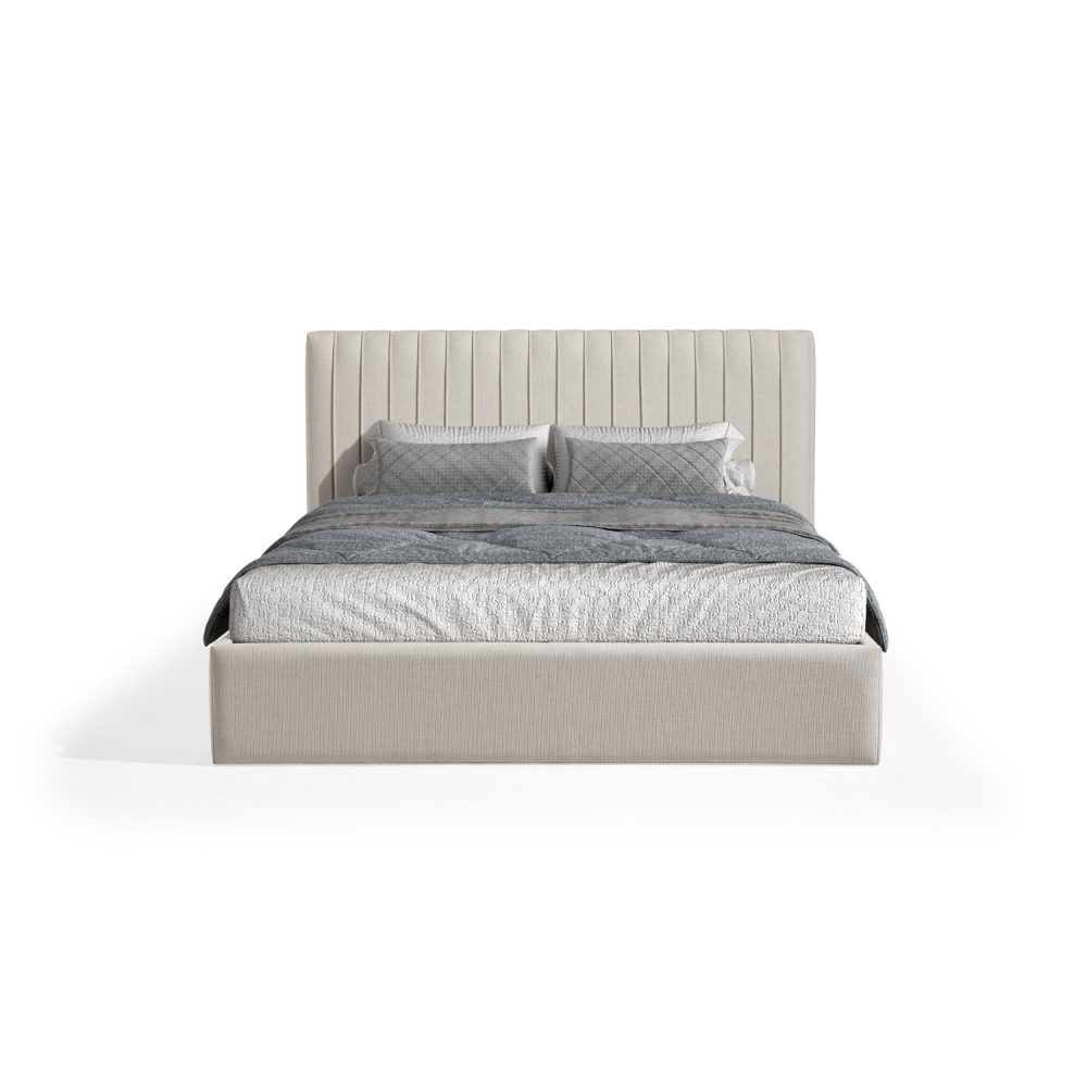Cama moderna e estofada em branco, com uma cabeceira alta de costura vertical, decorada com roupa de cama cinzenta, incluindo edredão acolchoado, manta e almofadas, em tons elegantes e contemporâneos.